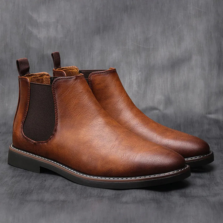 Black suede men's Chelsea boots, comfortable pull-on design, perfect for everyday fashion.