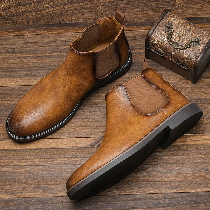 Comfortable men's Chelsea boots in tan leather, versatile ankle style for all-day wear.
