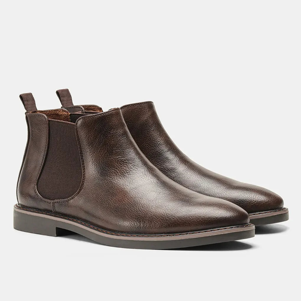 Premium men's ankle boots, classic Chelsea style, sleek design, suitable for any occasion.