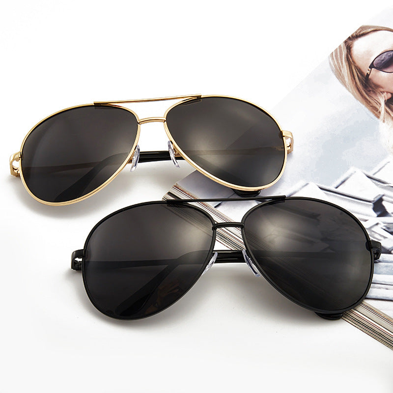Classic gold-frame aviator sunglasses for men & women, offering stylish UV protection.
