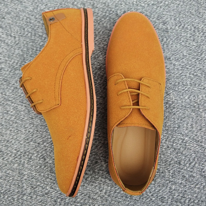 Detailed stitching on premium leather oxford shoes, showcasing elegant craftsmanship in men's formal wear.