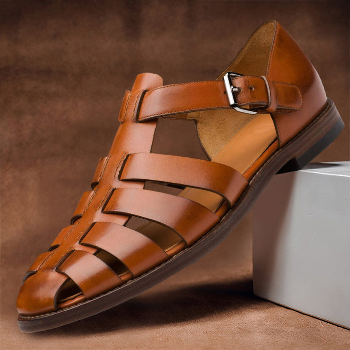 Stylish men's classic closed-toe fisherman sandals with adjustable strap, great for summer fashion and everyday comfort.