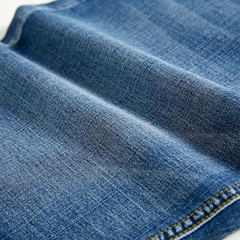 Blue classic men's relaxed fit denim shorts, versatile for casual summer outings.