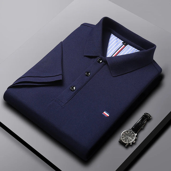 Men's button-down classic polo shirt. Lightweight, short sleeve, textured, great for smart casual everyday style.