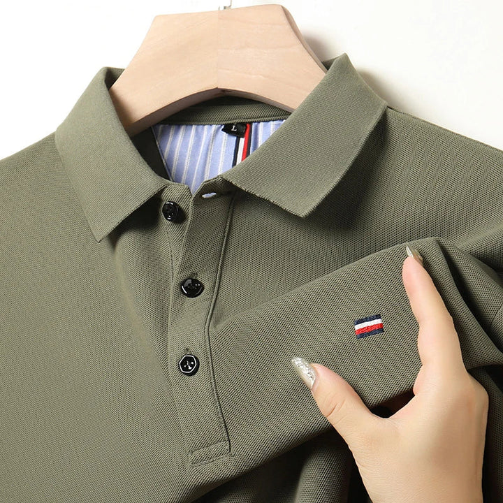 Stylish men's classic lightweight polo shirt. Short sleeve, versatile for modern casual & semi-formal fashion.