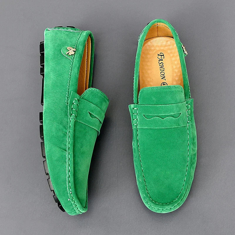 Classic men's penny loafers with flexible driving sole, perfect for smart casual spring fashion.