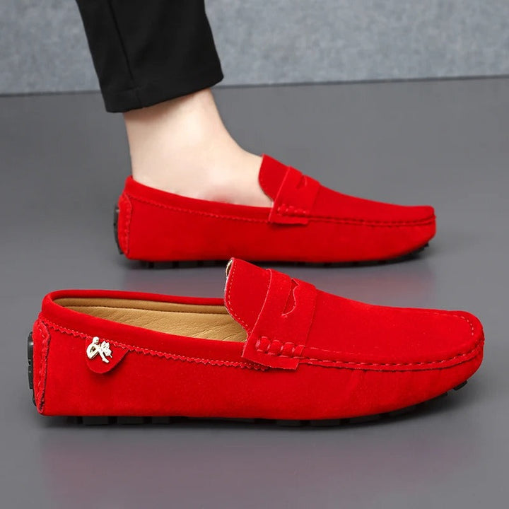 Men's fashion penny loafers, designed with a flexible driving sole for ultimate comfort and style.