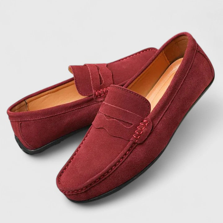 Side profile of men's classic slip-on comfort loafers, showcasing sleek design.