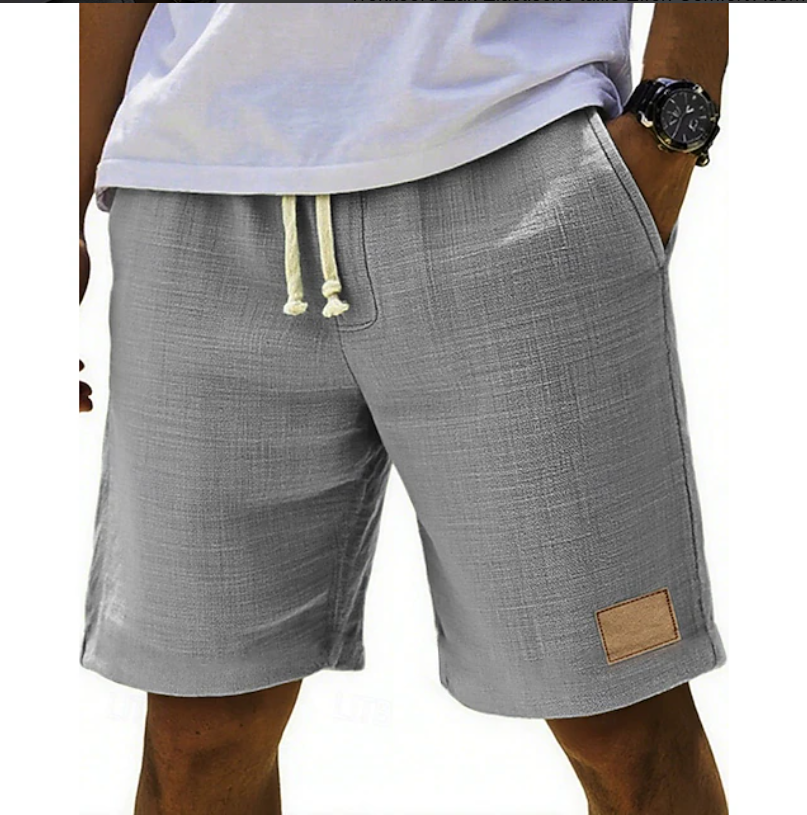 Comfortable men's relaxed fit drawstring shorts, ideal for beach days, vacation & everyday style.