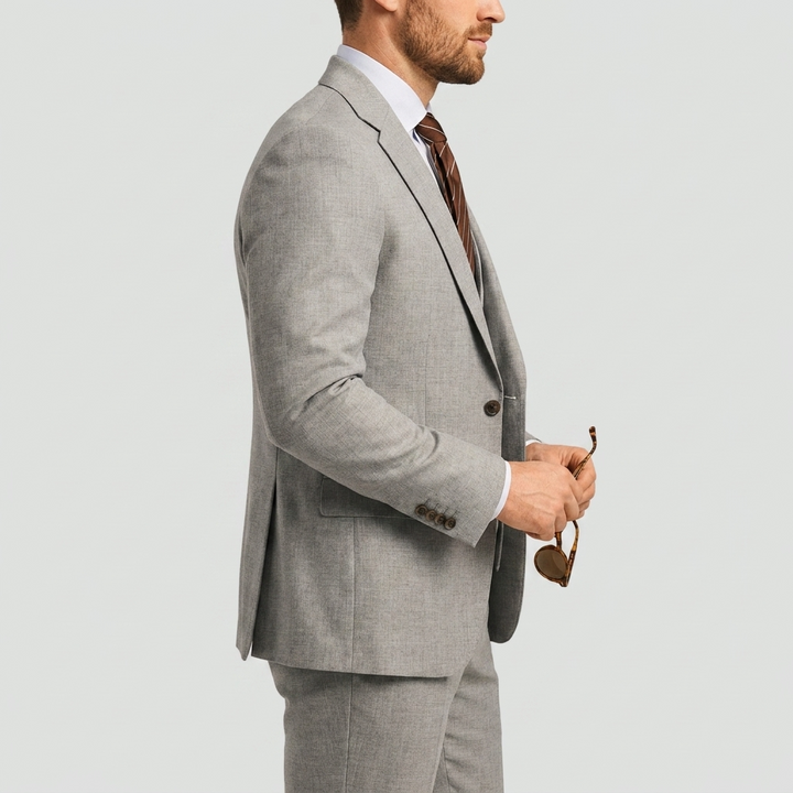 Navy blue men's formal 3-piece suit. Tailored blazer, waistcoat & trousers for elegant occasions.