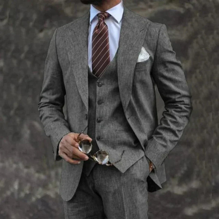 Stylish men's tailored suit for weddings & special occasions. 3-piece set with blazer, vest & pants.