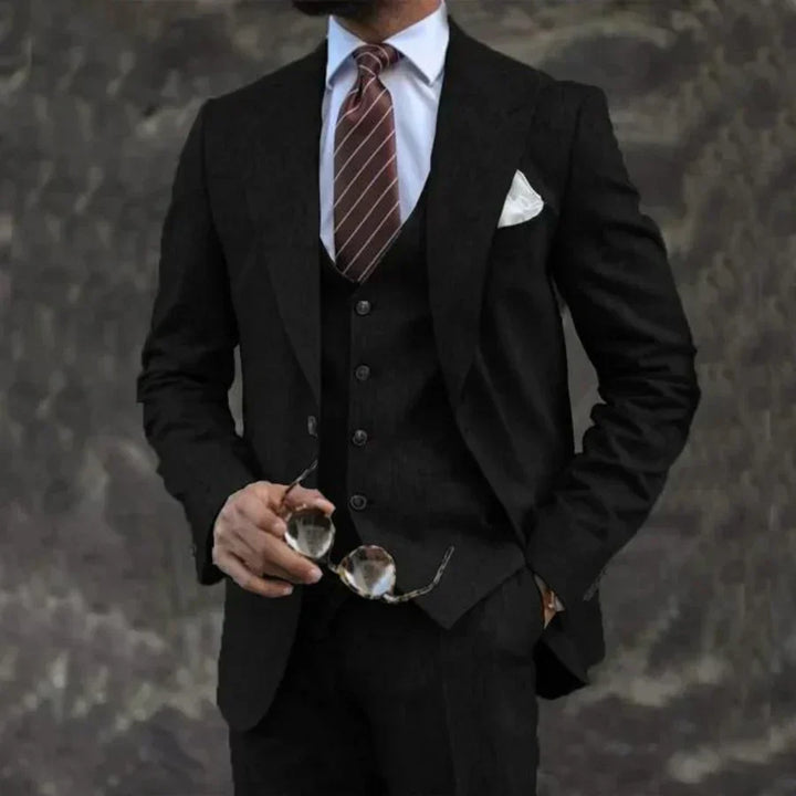 Premium men's business attire: tailored 3-piece suit. Blazer, waistcoat & trousers for professional style.