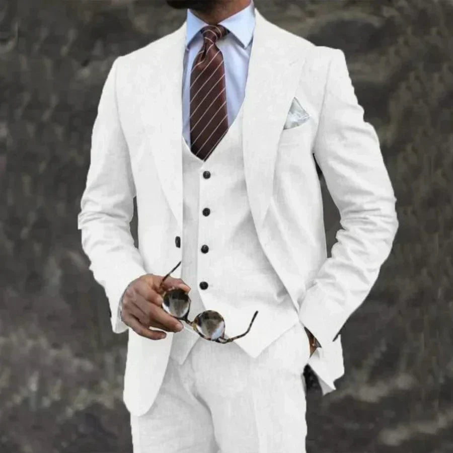 High-quality men's formal 3-piece suit. Includes a tailored blazer, waistcoat & trousers for elegance.