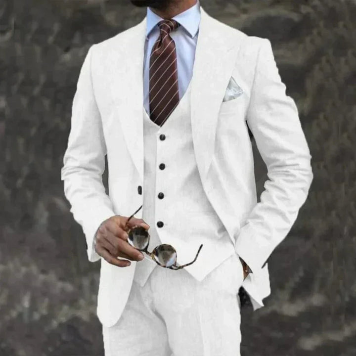 High-quality men's formal 3-piece suit. Includes a tailored blazer, waistcoat & trousers for elegance.