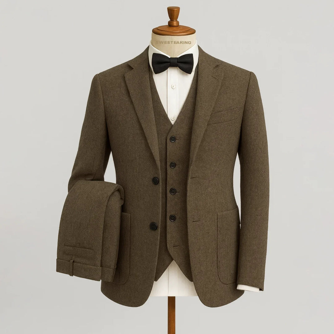 Elegant black men's three-piece suit, ideal for groom or business formal.