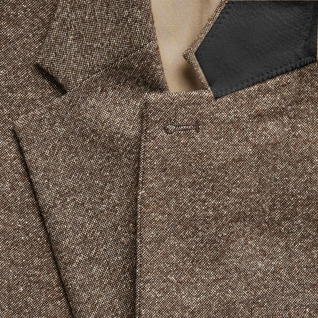 Gentleman's classic three-piece suit, complete with tailored blazer & vest.