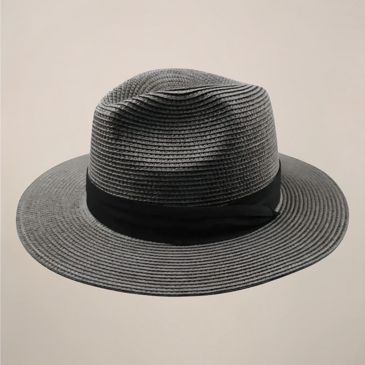 Close-up of a men's classic Panama straw hat, showing intricate weave & wide brim for ultimate sun protection.
