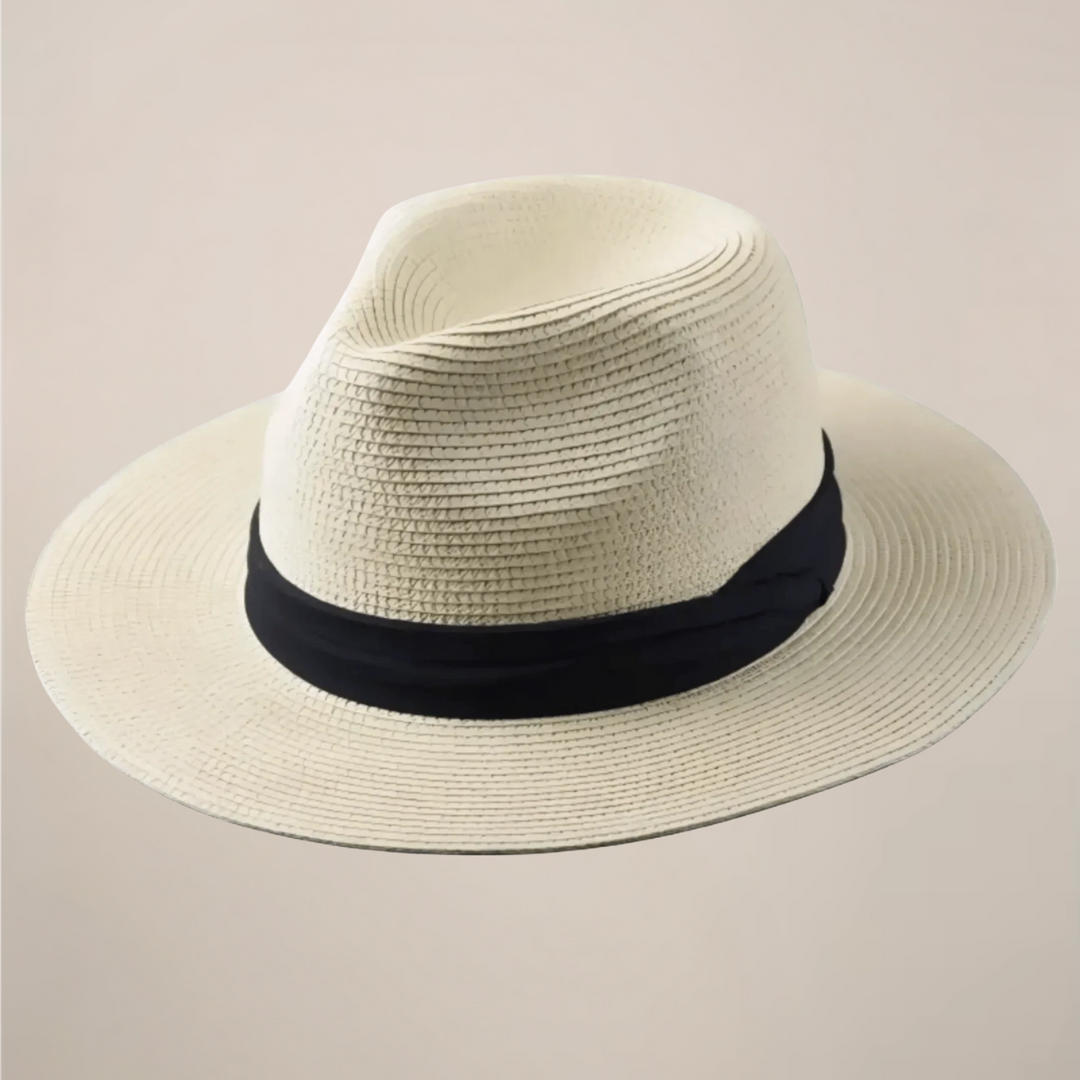Side view of a men's classic wide brim Panama hat, showcasing its elegant shape & stylish hatband for summer.