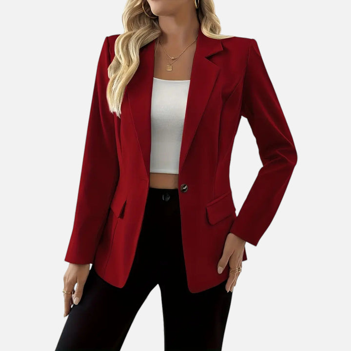 Classic single-breasted women's blazer in a solid color, perfect for elegant professional wear or smart casual outfits.