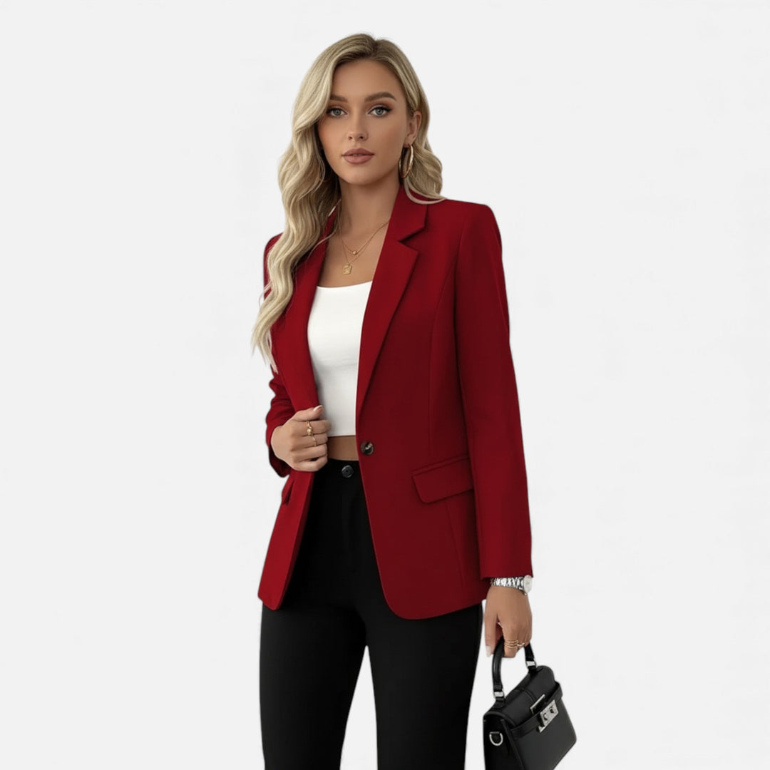 Tailored single-breasted women's blazer, ideal for office attire and a sophisticated professional look.