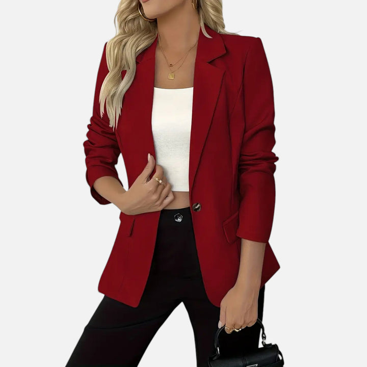 Timeless solid color women's single-breasted blazer, exuding elegance for any professional or smart casual occasion.