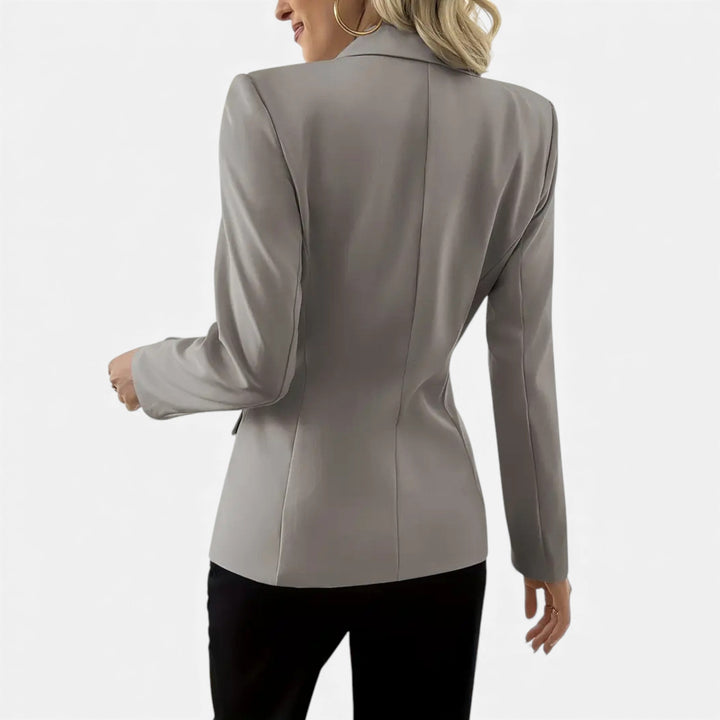 Fashionable women's single-breasted blazer, a must-have elegant jacket for spring, summer, and fall style.
