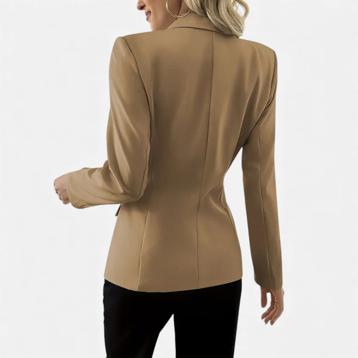 Versatile solid women's single-breasted blazer, easily dressed up for office or down for smart casual elegance.