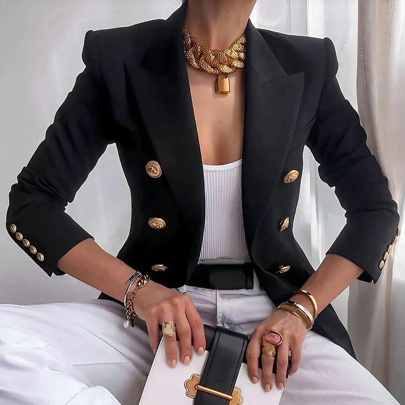 Classic tailored women's blazer, a timeless piece for professional and elegant fashion. Features a structured fit.