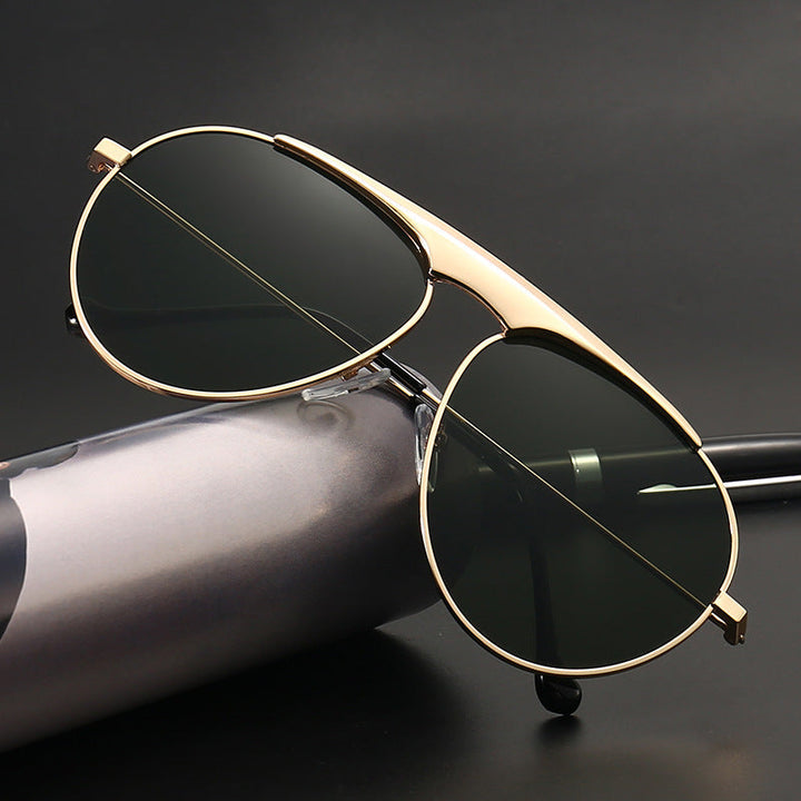 Classic unisex aviator sunglasses offering stylish UV protection, perfect for summer fashion & travel.
