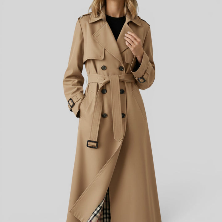 Classic women's belted trench coat. Elegant longline outerwear perfect for spring or autumn fashion.
