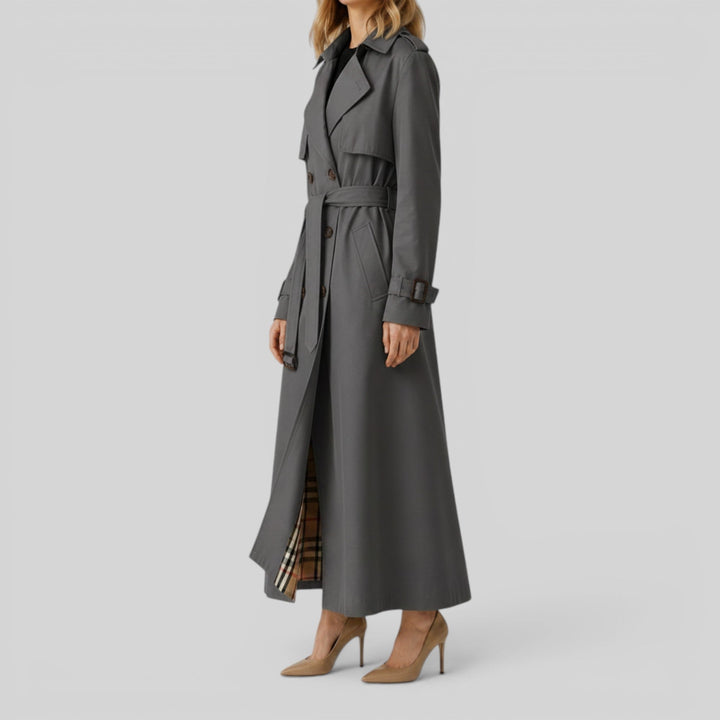 Classic women's trench coat. Elegant belted longline outerwear, a sophisticated addition to any fashion wardrobe.