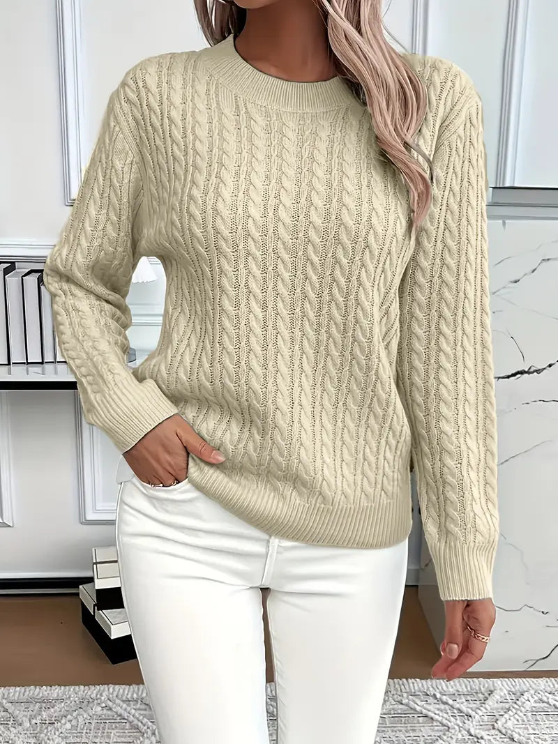 Timeless women's classic cable knit jumper. Cozy, stylish sweater perfect for autumn & winter knitwear fashion.