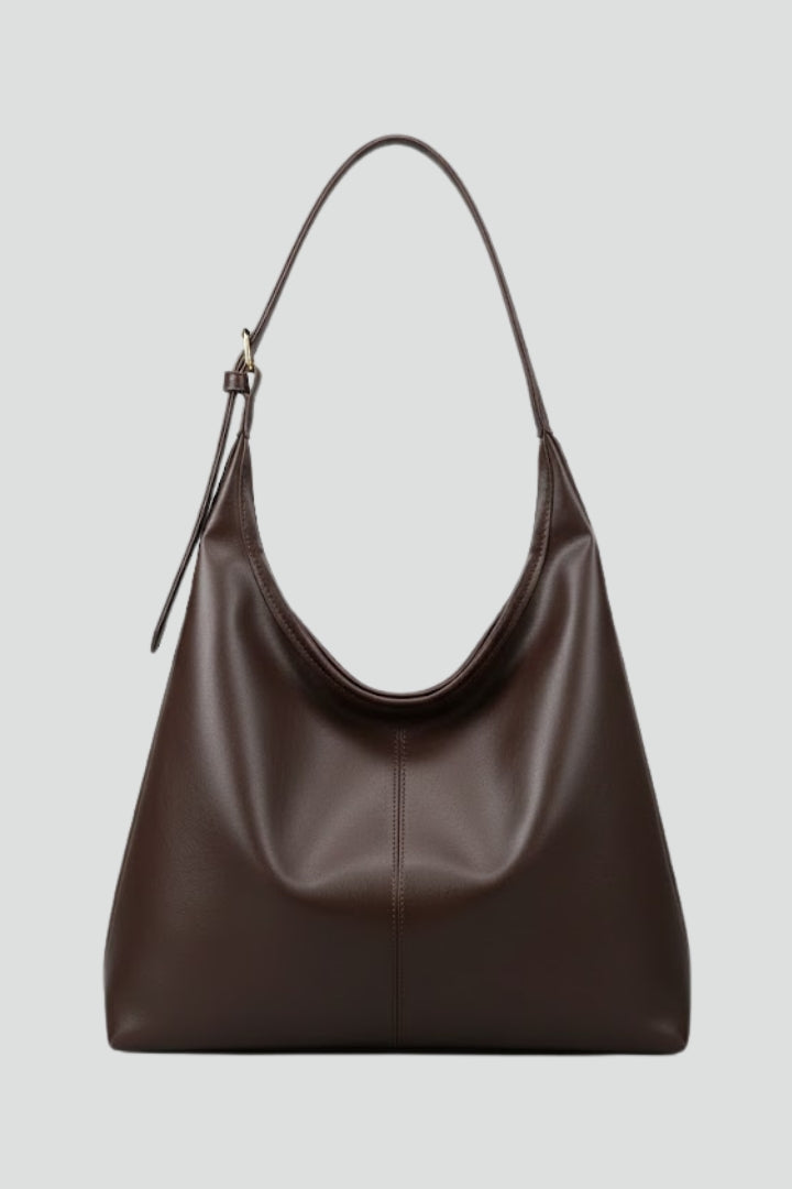 Classic women's faux leather tote bag, perfect for everyday fashion. Stylish shoulder handbag with large capacity.
