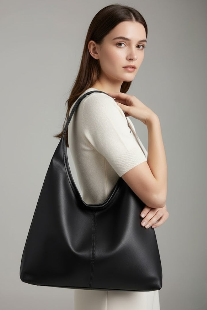 Practical women's faux leather tote bag. Large inner pocket, classic style, perfect shoulder handbag.