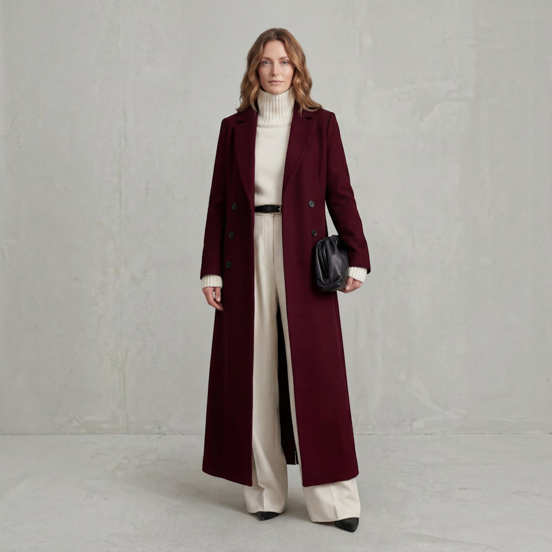Sophisticated women's long trench coat with double-breasted front for winter jacket.