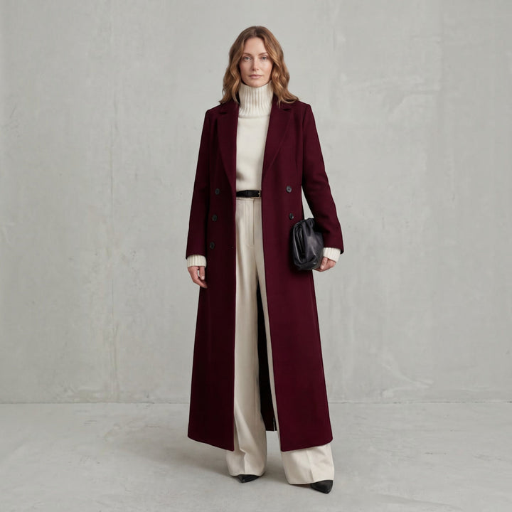 Sophisticated women's long trench coat with double-breasted front for winter jacket.