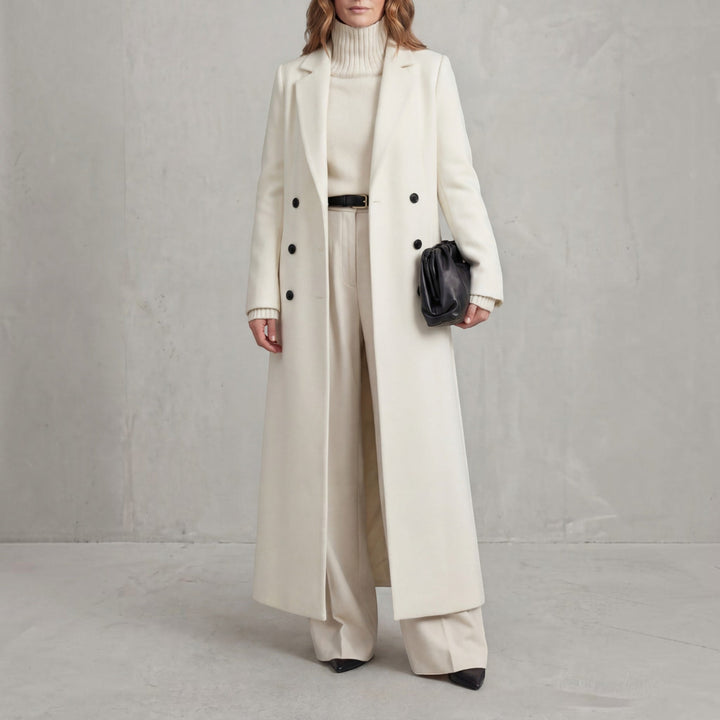 Stylish women's long double-breasted trench coat, a classic winter jacket.