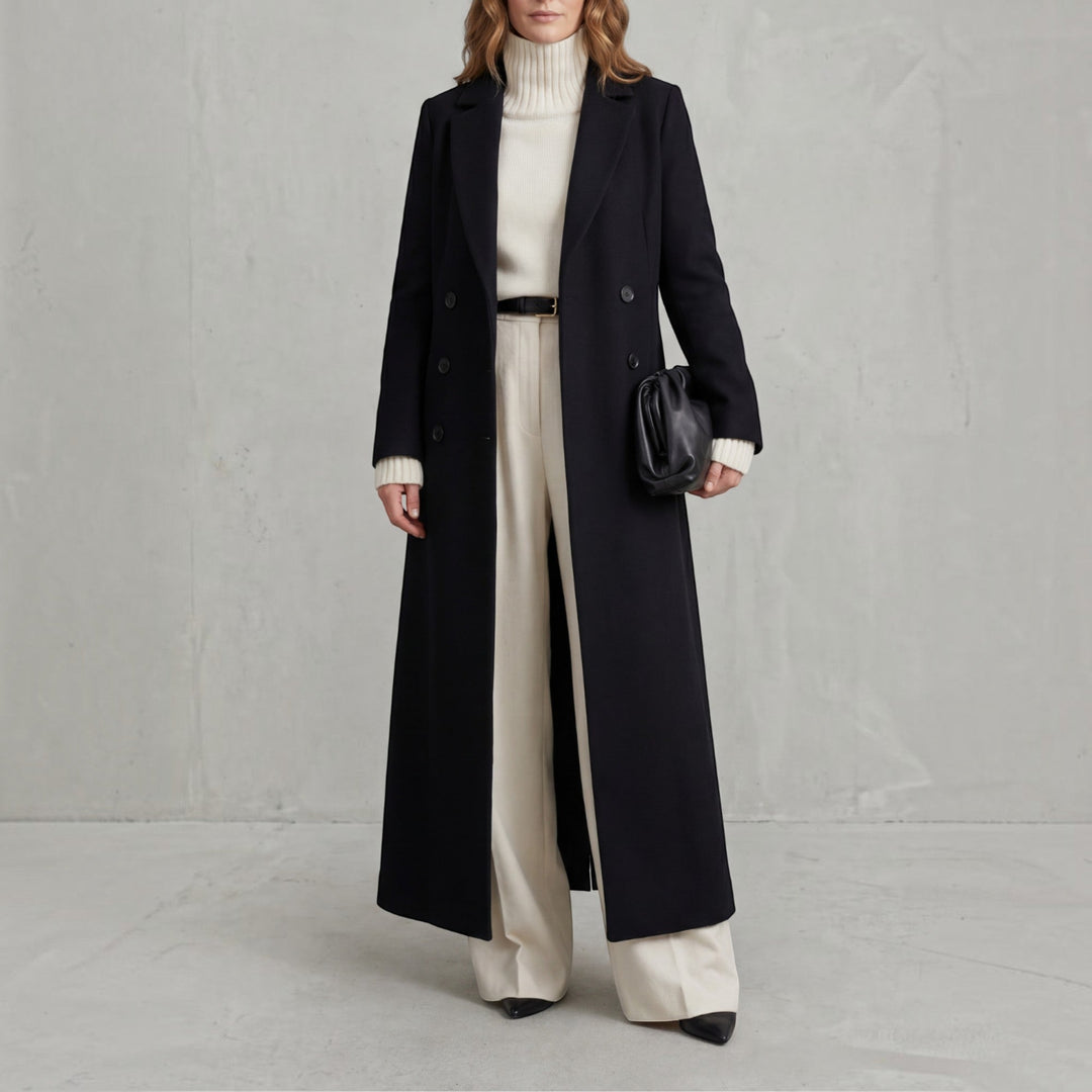 Women's sophisticated long coat, double-breasted trench style for cold weather.