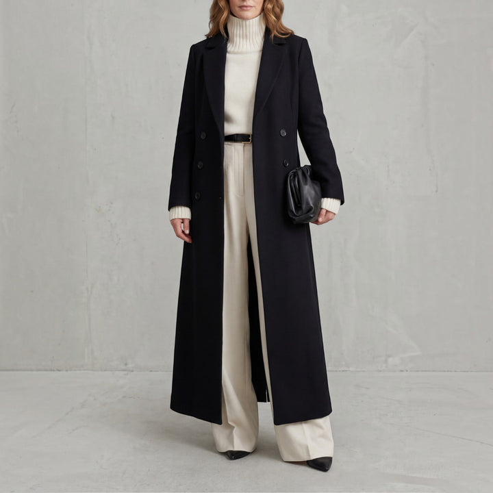 Women's sophisticated long coat, double-breasted trench style for cold weather.