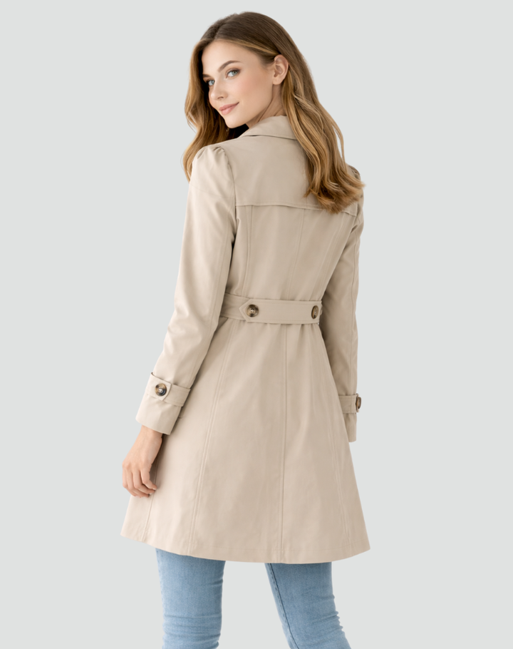 Women's classic mid-length trench coat featuring a stylish lapel design. Versatile tailored outerwear for any occasion.