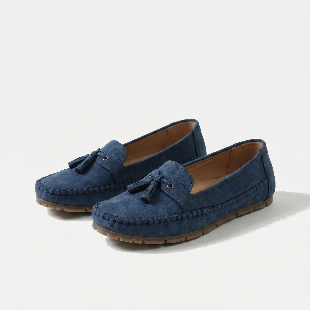 Women's classic tassel loafers on foot, showcasing comfortable everyday elegance and stylish women's fashion.