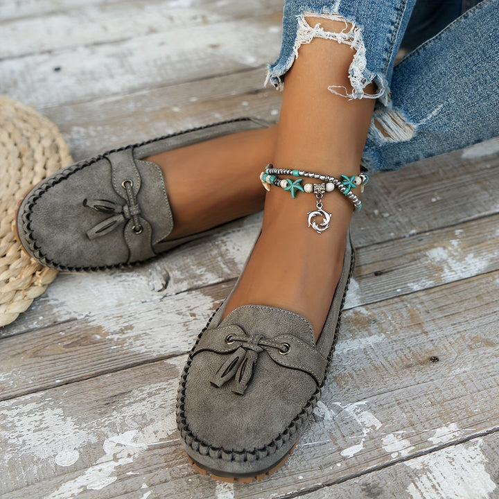 Comfortable slip-on women's tassel loafers for all-day wear. Elegant everyday footwear, versatile casual or office.