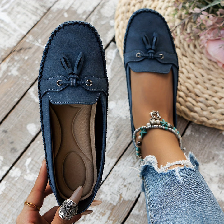 Front view: Women's comfortable slip-on tassel loafers, perfect for stylish everyday wear & women's fashion.