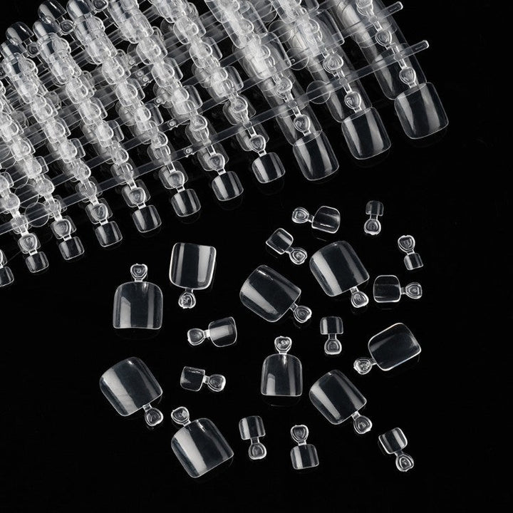 Professional clear acrylic nail tips, ideal for strong, durable nail extensions & creative nail art supplies.