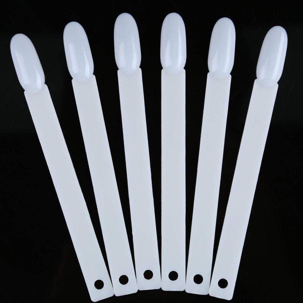 Salon nail display tips, clear plastic, ideal for organizing polish swatches & showcasing professional nail art.