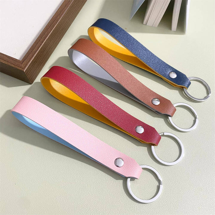Close-up of a stylish unisex premium leather keyring organizer, compact and sleek for everyday key management.