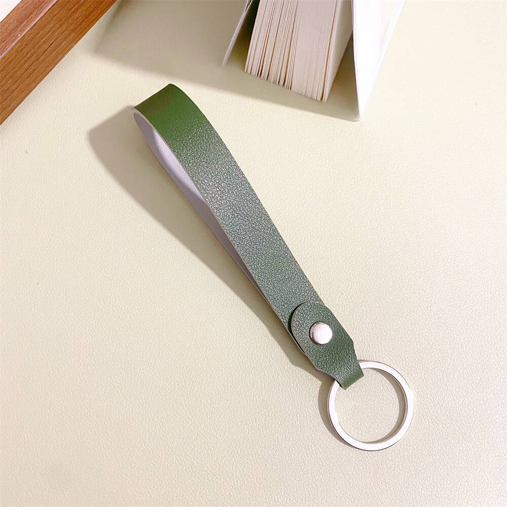 Premium compact leather keychain organizer, designed for secure and stylish storage of multiple keys.