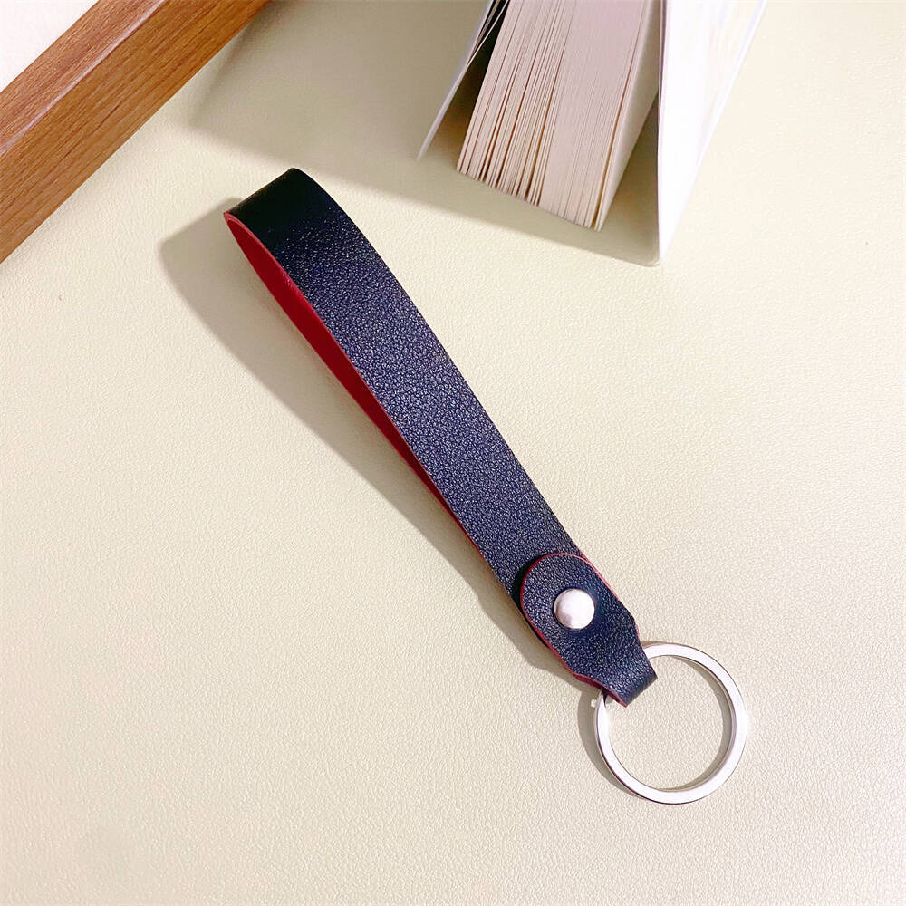 Unisex leather keyring organizer in brown, a sleek accessory and practical gift for smart key management.