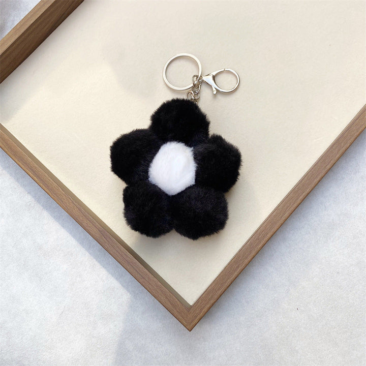 Assorted soft floral plush keychains, cute key holders and bag charms for gifts.