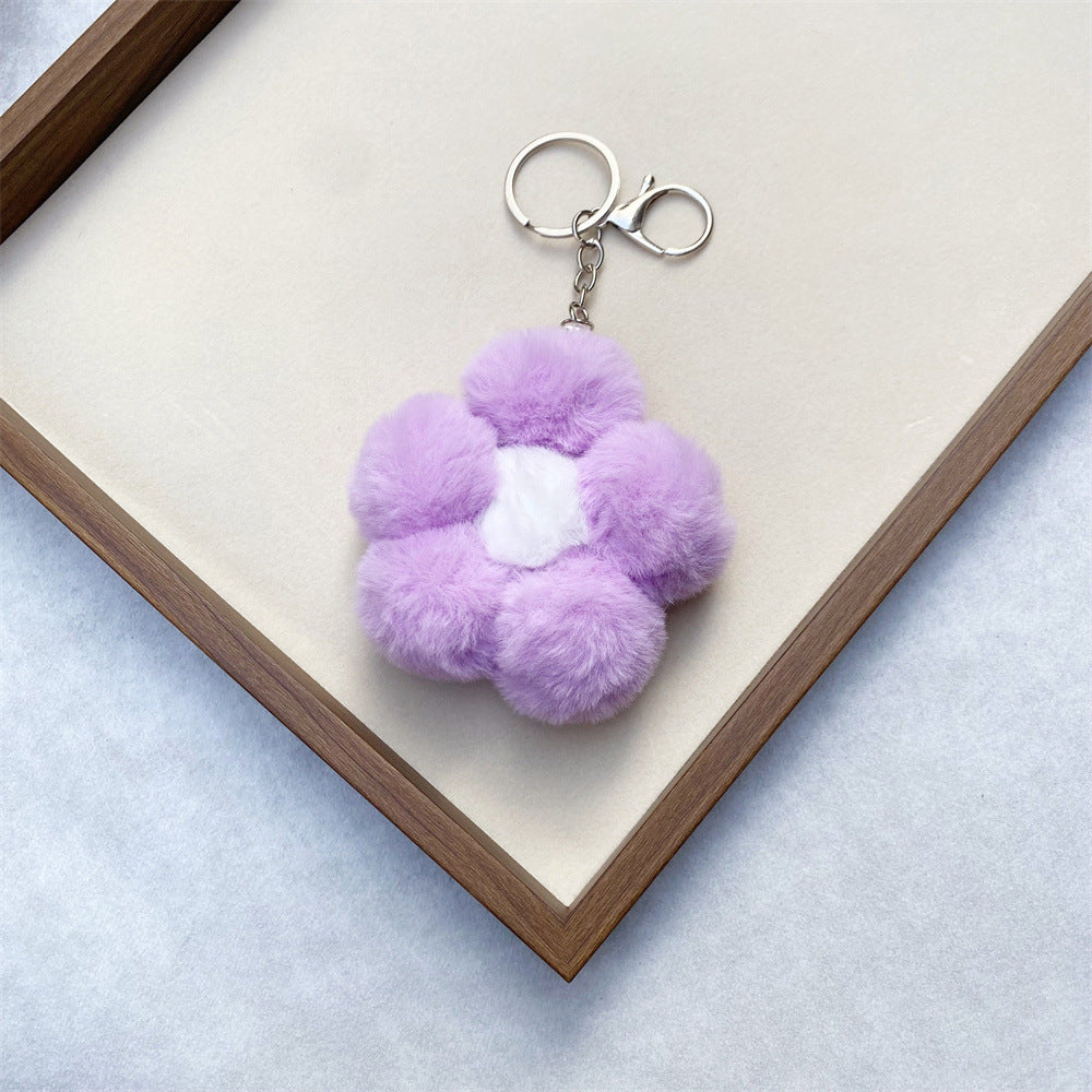 Decorative floral plush key charm, a soft and cute accessory, ideal gift.